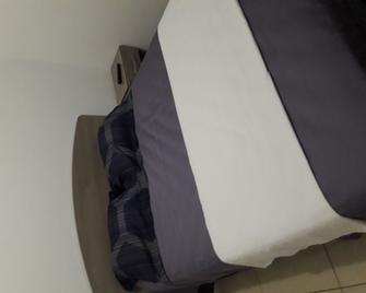 Souvenir Hostal en Nicaragua - Managua - Slaapkamer