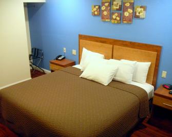 FairBridge Inn & Suites Merced/Gateway to Yosemite - Merced - Schlafzimmer