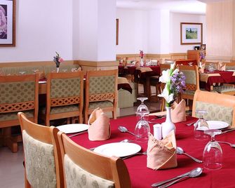 Hotel Pooram International - Thrissur - Restaurante