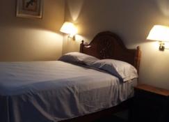 Hotel Plaza Palmero - San Pedro Sula - Slaapkamer
