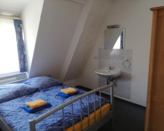 Gästehaus Heigeleshof - Ulm - Bedroom