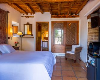 Can Lluc Boutique Country Hotel & Villas, a member of Beyond Green - Sant Antoni de Portmany - Schlafzimmer