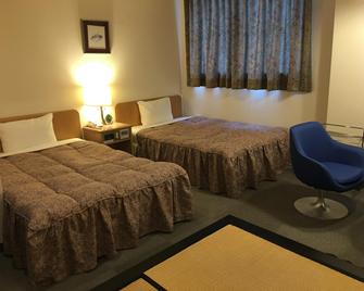 Hotel Tsuchiya - Taketa - Schlafzimmer