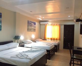 Mañana Hotel - Olongapo - Schlafzimmer