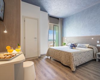 Hotel Montecarlo 3 Stelle Superior - קאורלה - חדר שינה