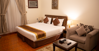 Almawasem Alarbaa Hotel Suites - Tabuk - Bedroom
