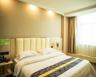 Greentree Inn Jinhua South Railway Station - Jinhua - Schlafzimmer