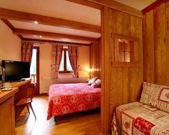 Chalet Plan Gorret - كورمايور - غرفة نوم