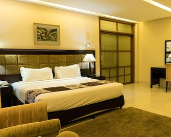 The Avenue Hotel & Suites - Chittagong - Schlafzimmer