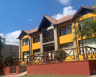 Tierra Merlina - Villa de Merlo - Edificio