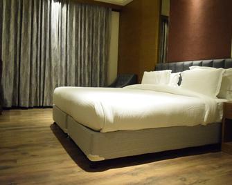 Hotel 25 Hours - Indore - Slaapkamer
