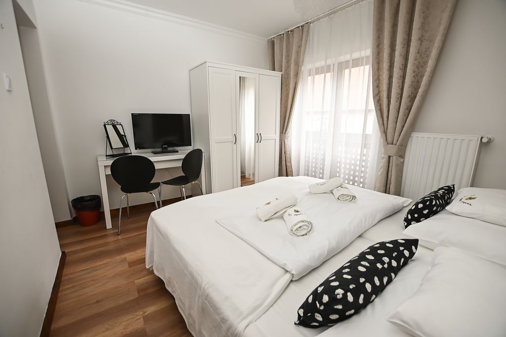 Vaskó Panzió Borpince - Tokaj - Schlafzimmer