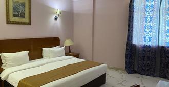 Al Massa Hotel - Al Ain - Yatak Odası