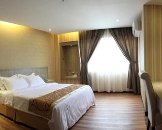 Mandarin Hotel Kota Kinabalu - קוטה קינבאלו - חדר שינה