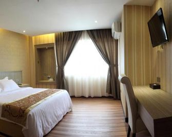Mandarin Hotel - קוטה קינבאלו - חדר שינה