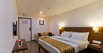 Hotel Casa, Vadodara - Vadodara - Schlafzimmer