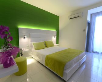 Giulivo Hotel & Village - Baia Domizia - Спальня