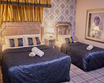 Killarney Inn - Killarney - Bedroom