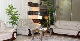 Ajmal Al Masaken Hotel Apartments - Riyadh - Living room