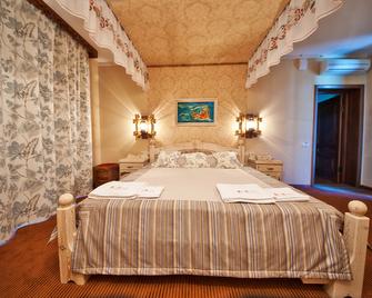 Zhar-Ptitsa Hotel - ג'לנדז'יק - חדר שינה