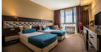 Business Hotel Plovdiv - Plowdiw - Schlafzimmer