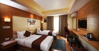 Hotel Middle Path & Spa - Pokhara - Camera da letto