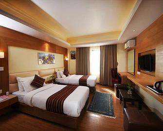 Hotel Middle Path & Spa - Pokhara - Yatak Odası