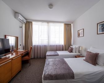 Garni Hotel Le Petit Piaf - Belgrad - Sovrum