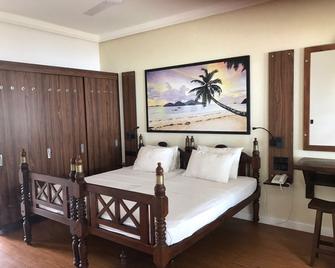 Sri Gemunu Beach Resort - Unawatuna - Bedroom