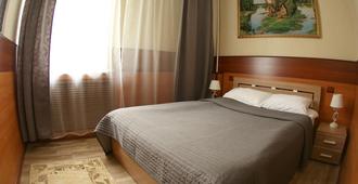 Hotel Moneron - Yuzhno-Sakhalinsk - Bedroom