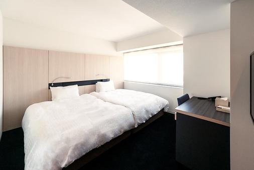 Hotel Sunroute Tokushima - Tokushima - Bedroom