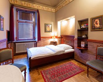 Hotel Continental - Pilsen - Schlafzimmer