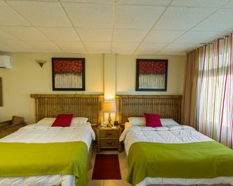 Villa Cofresi Hotel - Rincon - Schlafzimmer