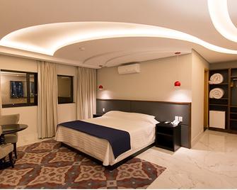 Adria Premium Hotel - Guarapuava - Schlafzimmer