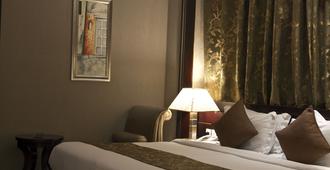 Ekono By Leva Jeddah Airport Hotel - Jeddah - Bedroom