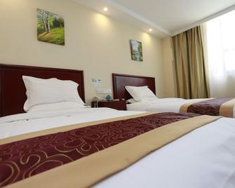 Greentree Inn Nanjing Jingwu Road Yueyuan Express Hotel - نانجينغ - غرفة نوم