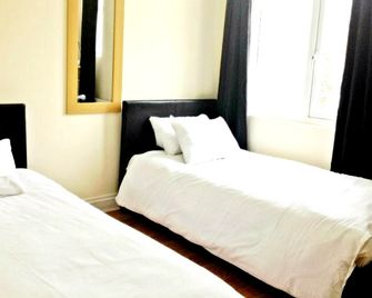 City View Hotel - Roman Road Market - לונדון - חדר שינה