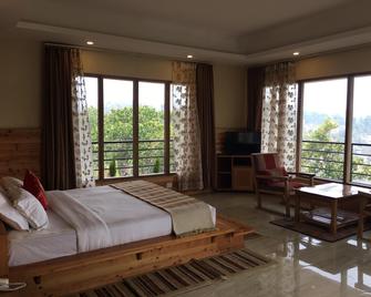 Queen's Hill Hotel & Resort - Mirik - Bedroom