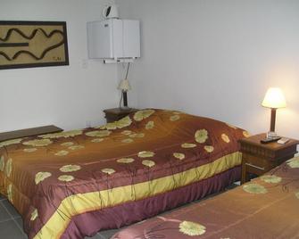 Hotel Artisan - Jaguarão - Camera da letto