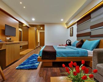 Aarya Grand Hotels & Resorts - Ahmedabad - Bedroom