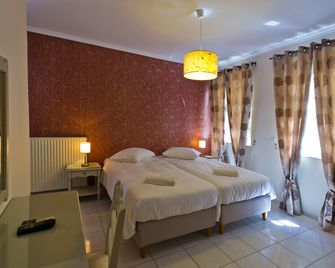 Alkionides Pension - Hydra - חדר שינה