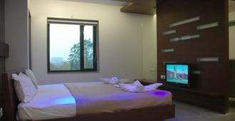 Hotel Kanan - Ahmedabad - Camera da letto