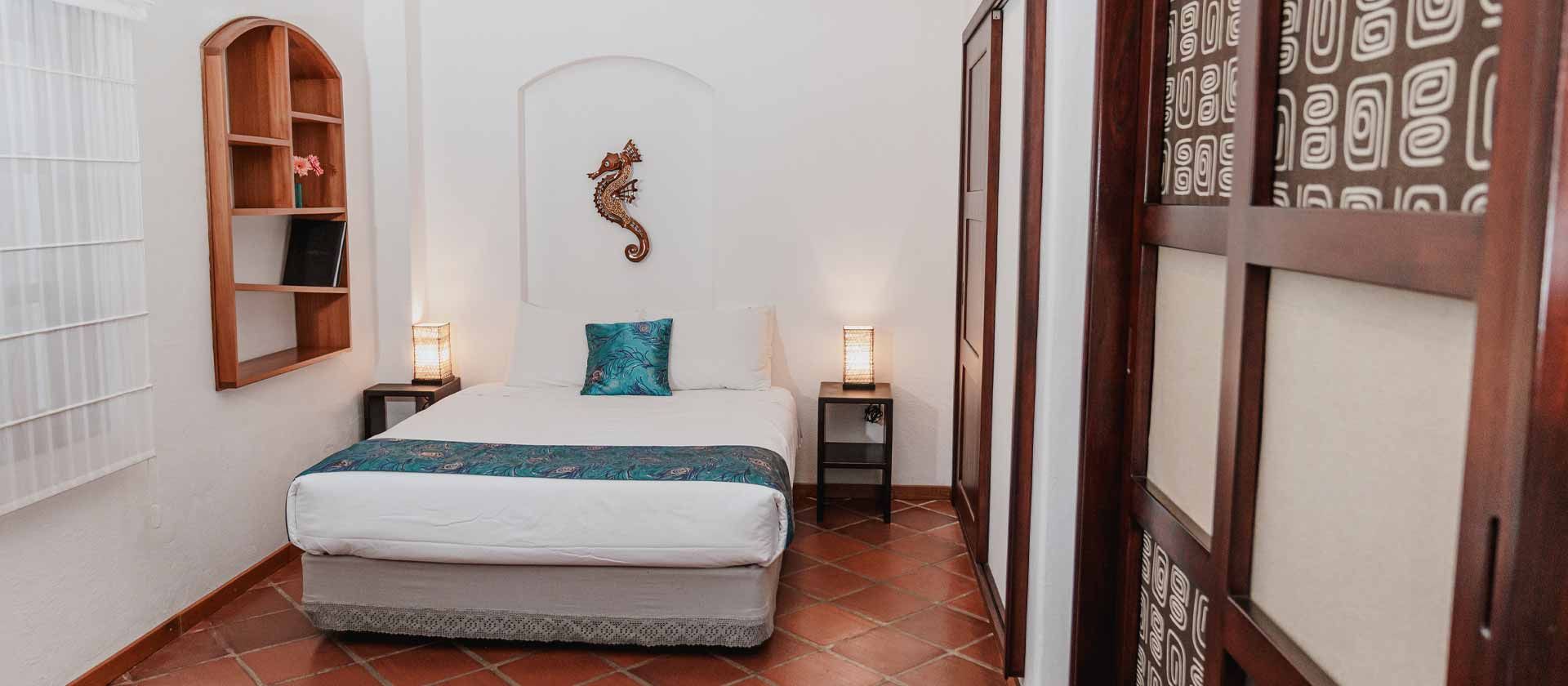 Hotel Galapagos Suites - بورتو أيورا - غرفة نوم