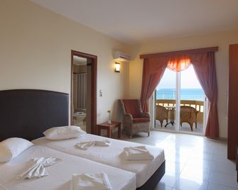Theo Beach Hotel Apartments - Rétino - Habitación