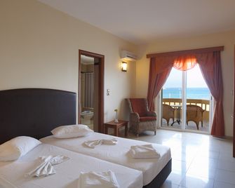 Theo Beach Hotel Apartments - Rétino - Habitación