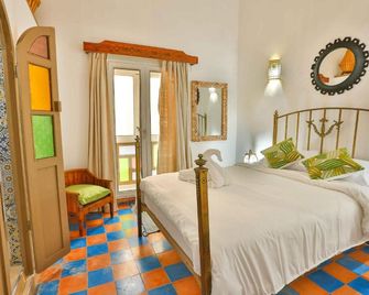 فندق دار مونيا الصويرة - الصويرة - غرفة نوم