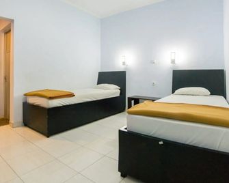Hotel Ledetadu - Kupang - Ložnice