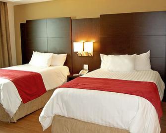 برينسيبي هوتل آند سويتس - بنما سيتي (بنما) - غرفة نوم