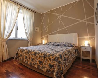 B&B Ai Tre Cavalli - Cherasco - Schlafzimmer