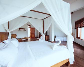 Cardamon Hotel Nilaveli - Trincomalee - Bedroom